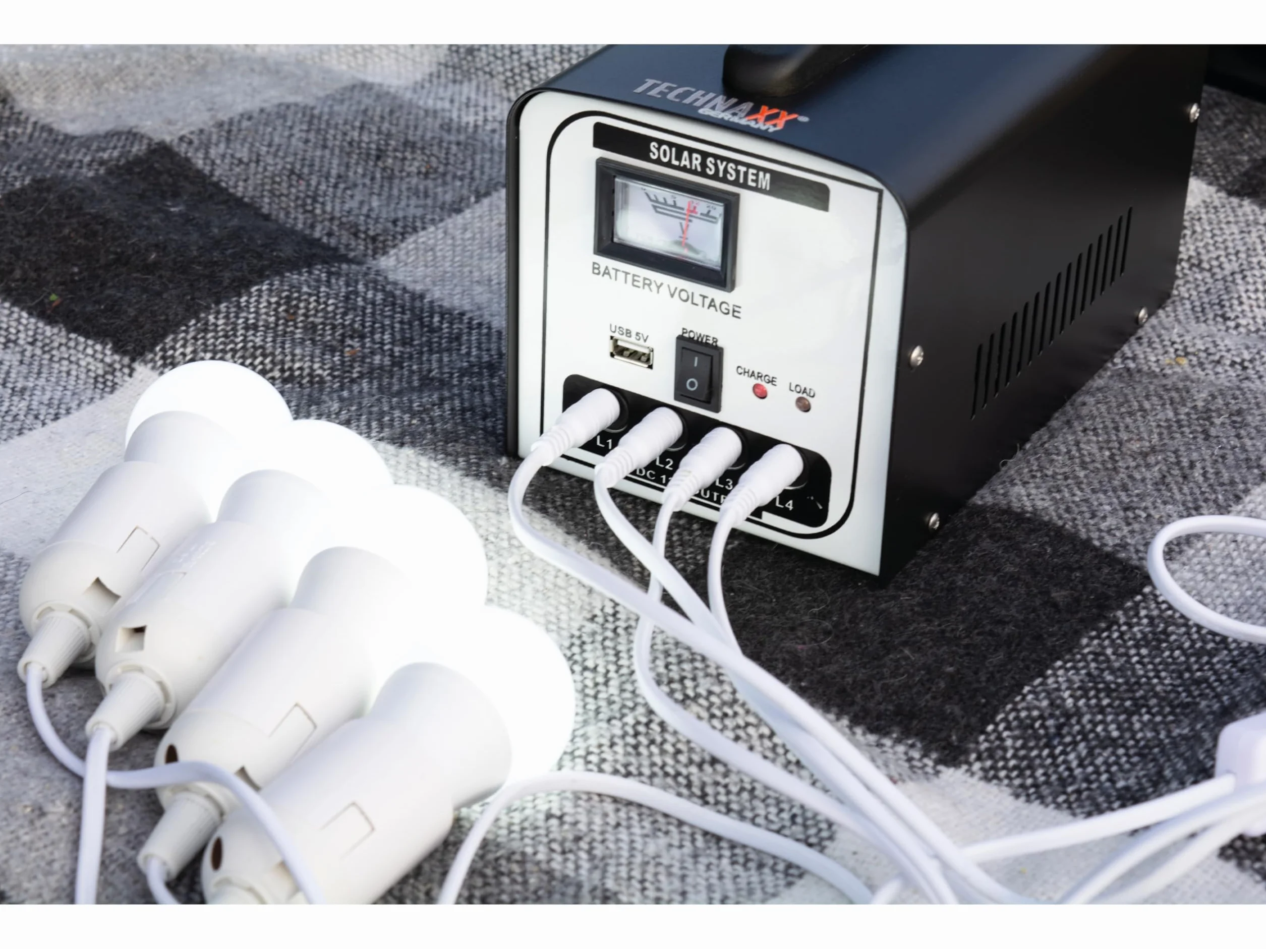 Technaxx TX-200 solarna stacja zasilająca 18 W składany panel słoneczny 4 żarówki LED na zewnątrz kemping awaryjny